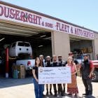Image of Worthy of Wheels receiving their grant from Florence Copper.