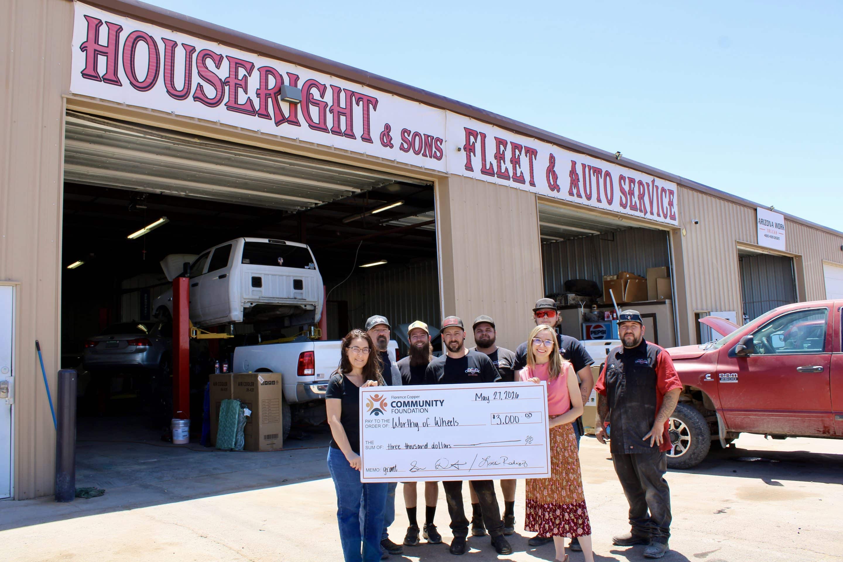 Image of Worthy of Wheels receiving their grant from Florence Copper.